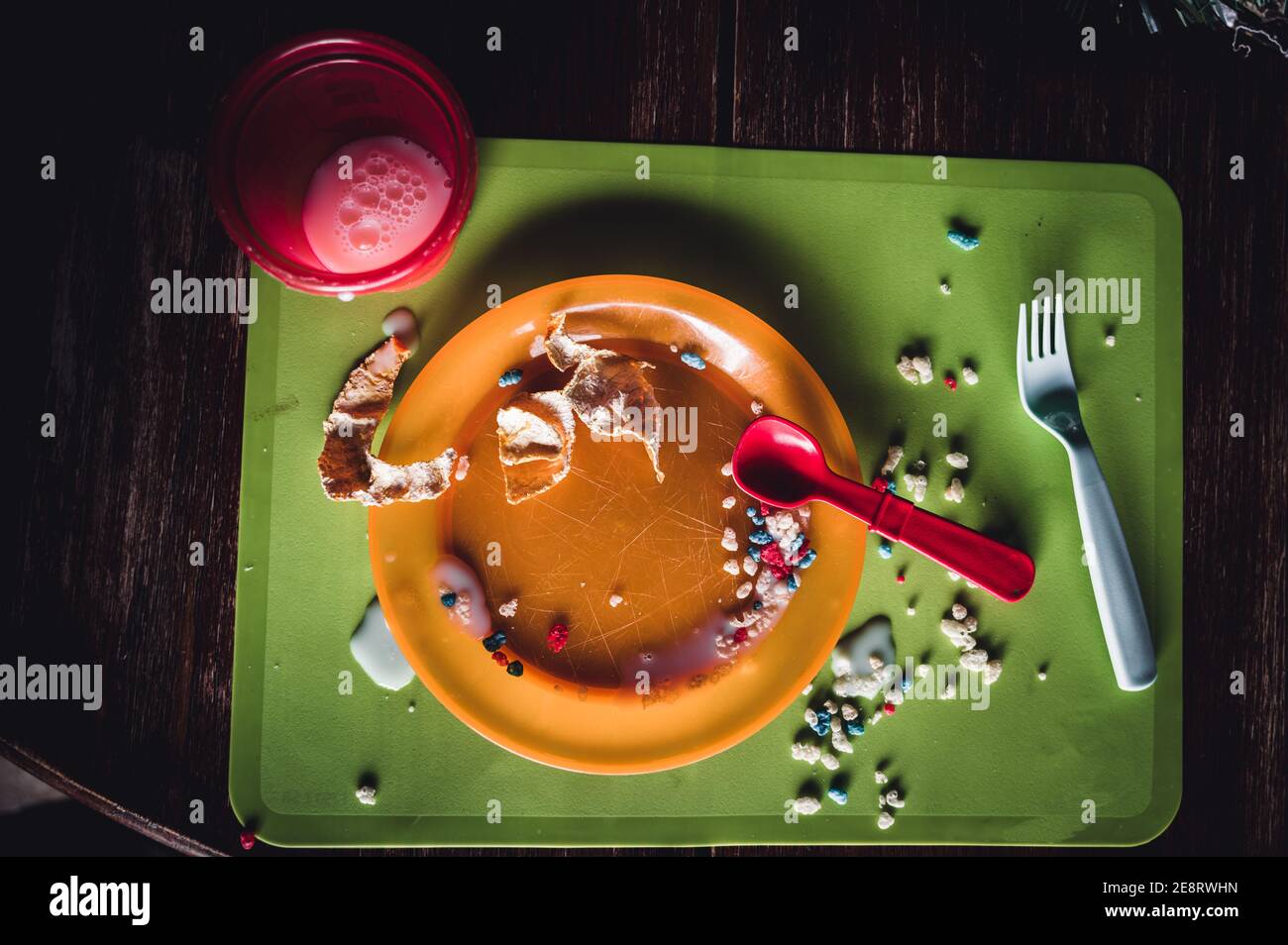 Children can be messy eaters typical arrangement after eating Stock