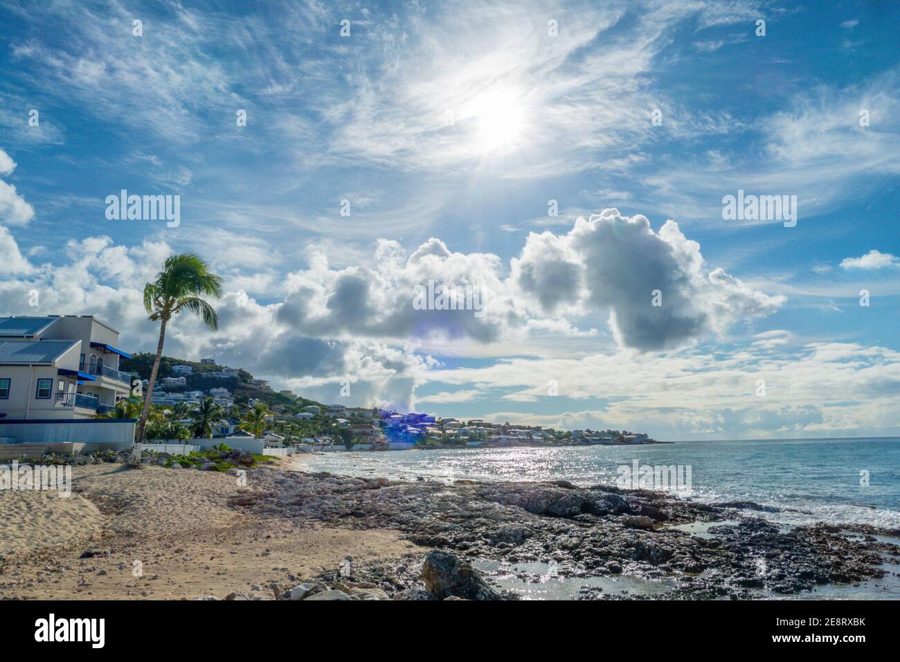 Beautiful white cloudy sky with the sun rising. Stock Photo