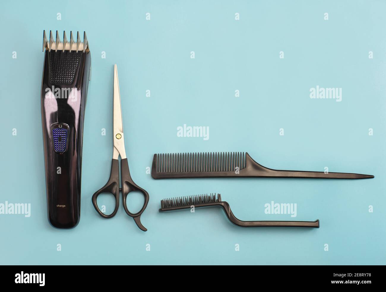 barber tools on blue background. hair clipper, comb, scissors and brush. man  hair stylist equipment. male beauty care. home hair cut tools. hairdresse  Stock Photo - Alamy