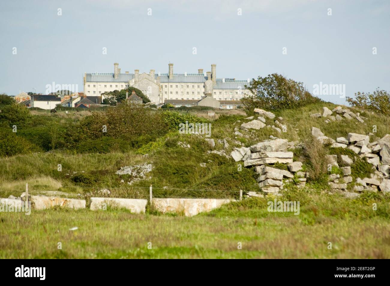 The prison and young offenders unit on the Isle of Portland, Dorset. Convicts at the Victorian jail used to have to quarry rocks of the prized Portlan Stock Photo