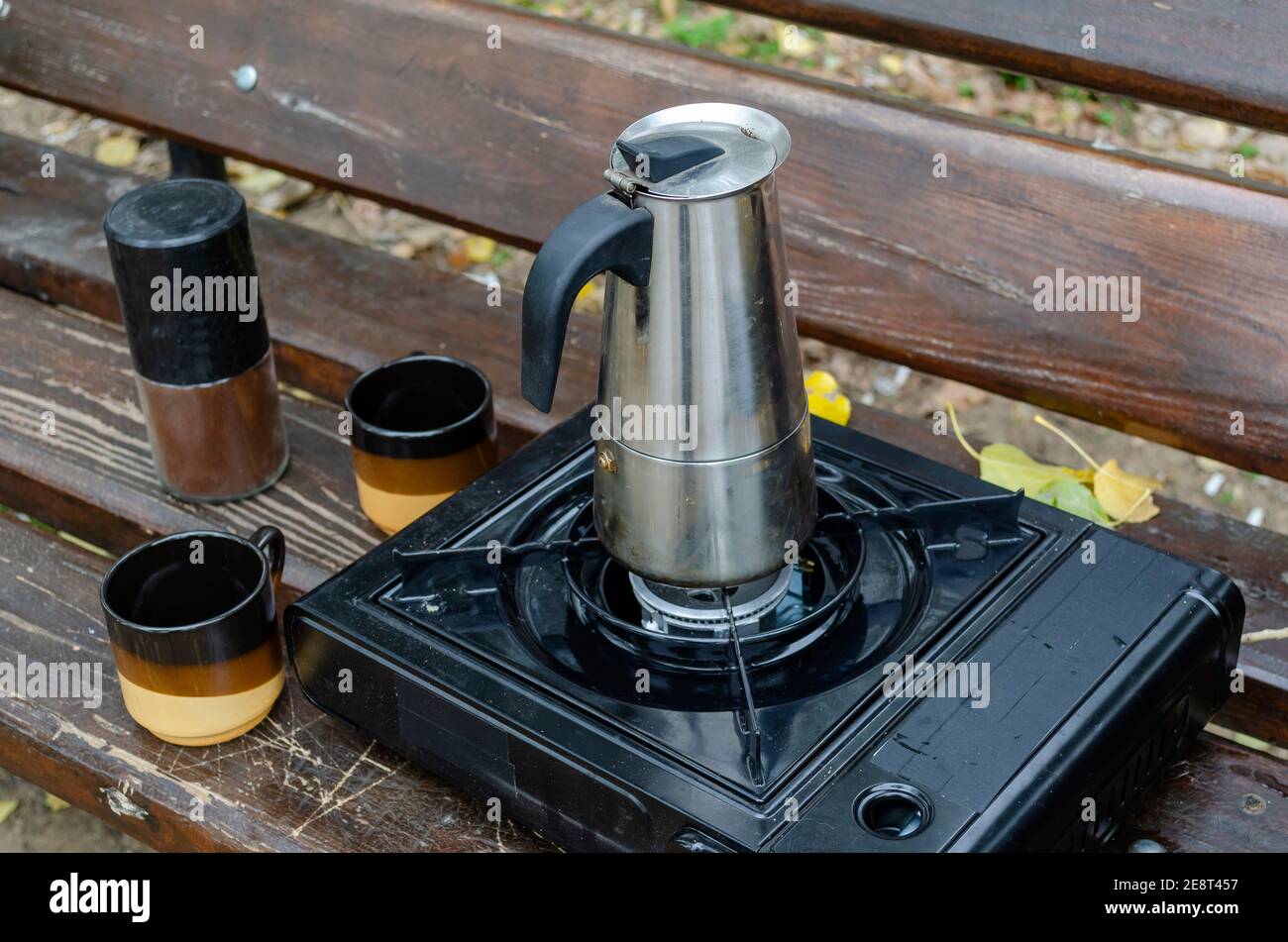 Making camping coffee from a geyser coffee maker on a gas burner, Stock  image