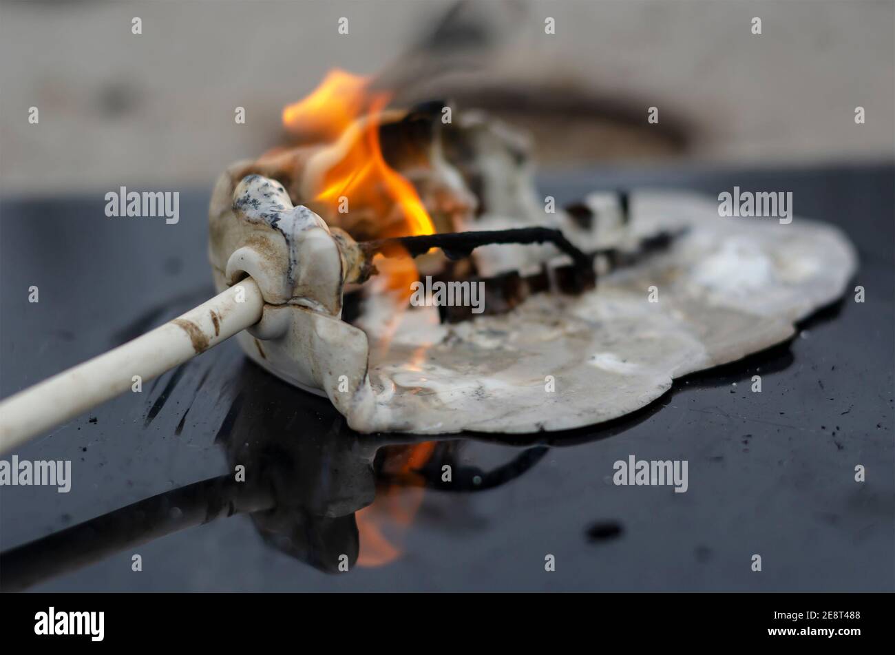 Household electrical appliance fire concept. Final stage of power strip