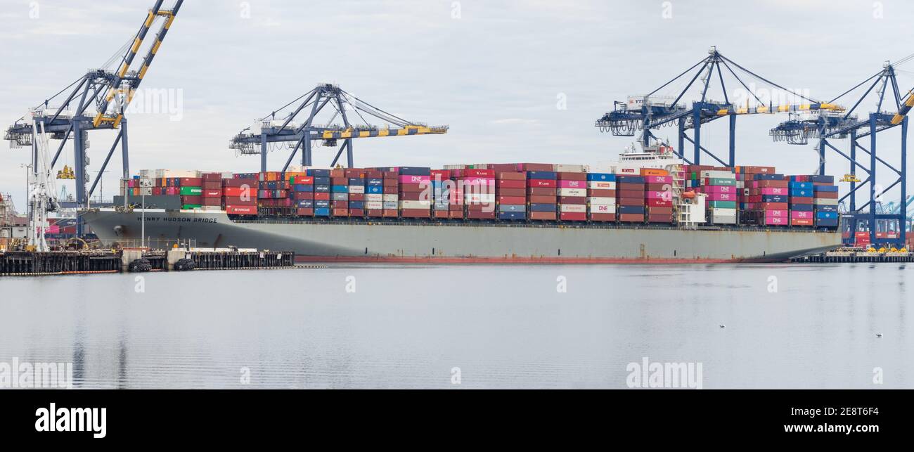 Image of the container ship Henry Hudson Bridge shown loading/unloading at the Port of Los Angeles. Stock Photo