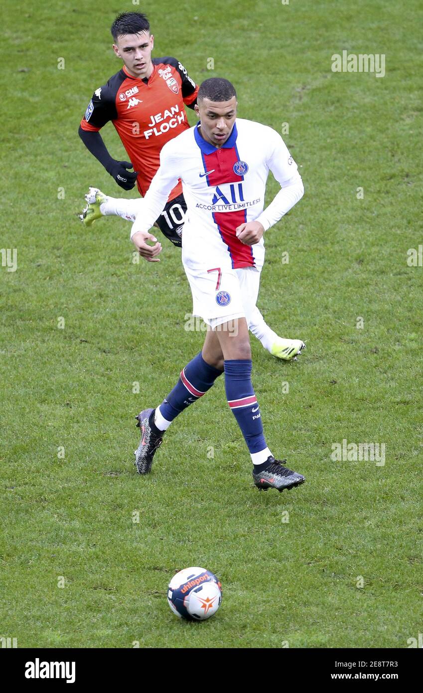 Kylian Mbappe of PSG, Enzo Le Fee of Lorient during the French
