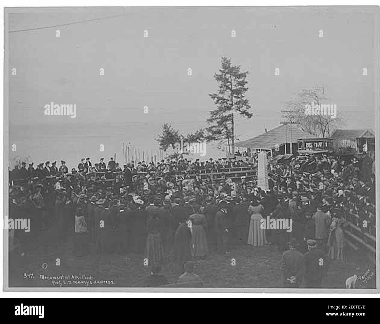Monument dedication at Alki Point showing Edmond Meany orating, West Seattle neighborhood, Seattle, November 13, 1905 (PEISER 101). Stock Photo