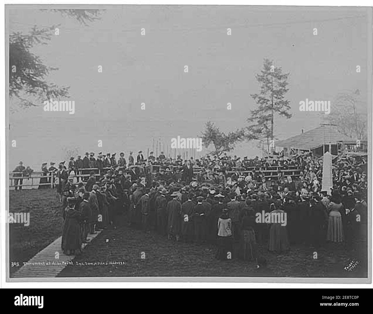 Monument dedication at Alki Point showing Samuel H Piles orating, West Seattle neighborhood, Seattle, November 13, 1905 (PEISER 103). Stock Photo