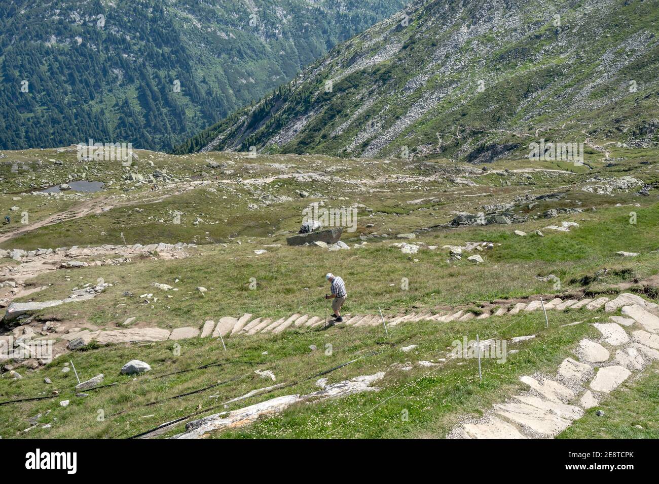 Elder male hike down from Olpererhutte in Austria Zillertal Alps Stock Photo