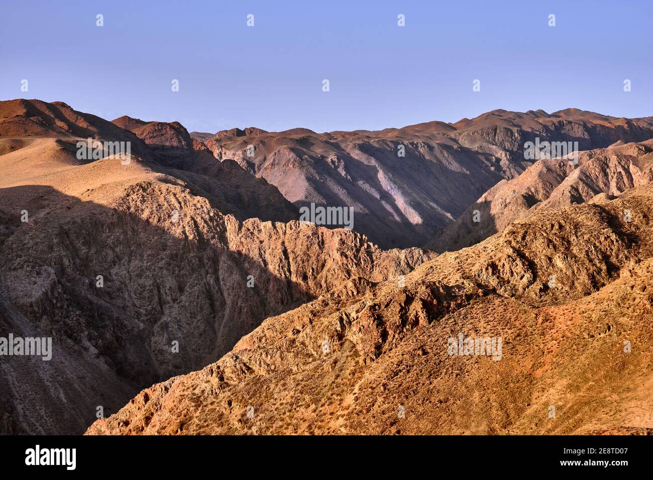 Valley With Ridges Mountain valley with numerous ridges and chiaroscuro Stock Photo - Alamy