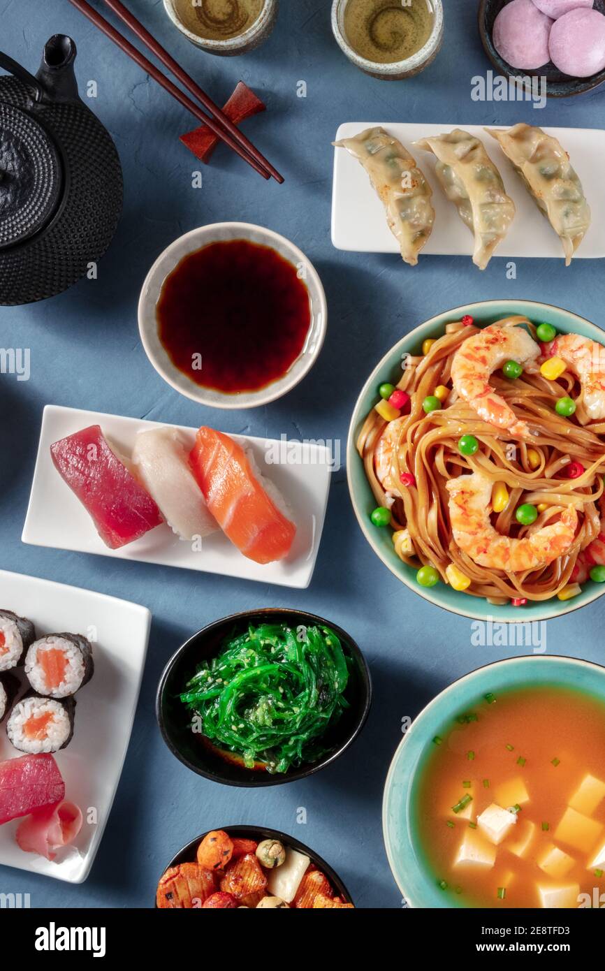 Japanese dinner, overhead flat lay shot of a variety of dishes of Japan