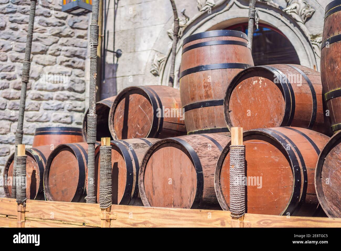 Wine barrels stacked in the old cellar of the winery Stock Photo - Alamy