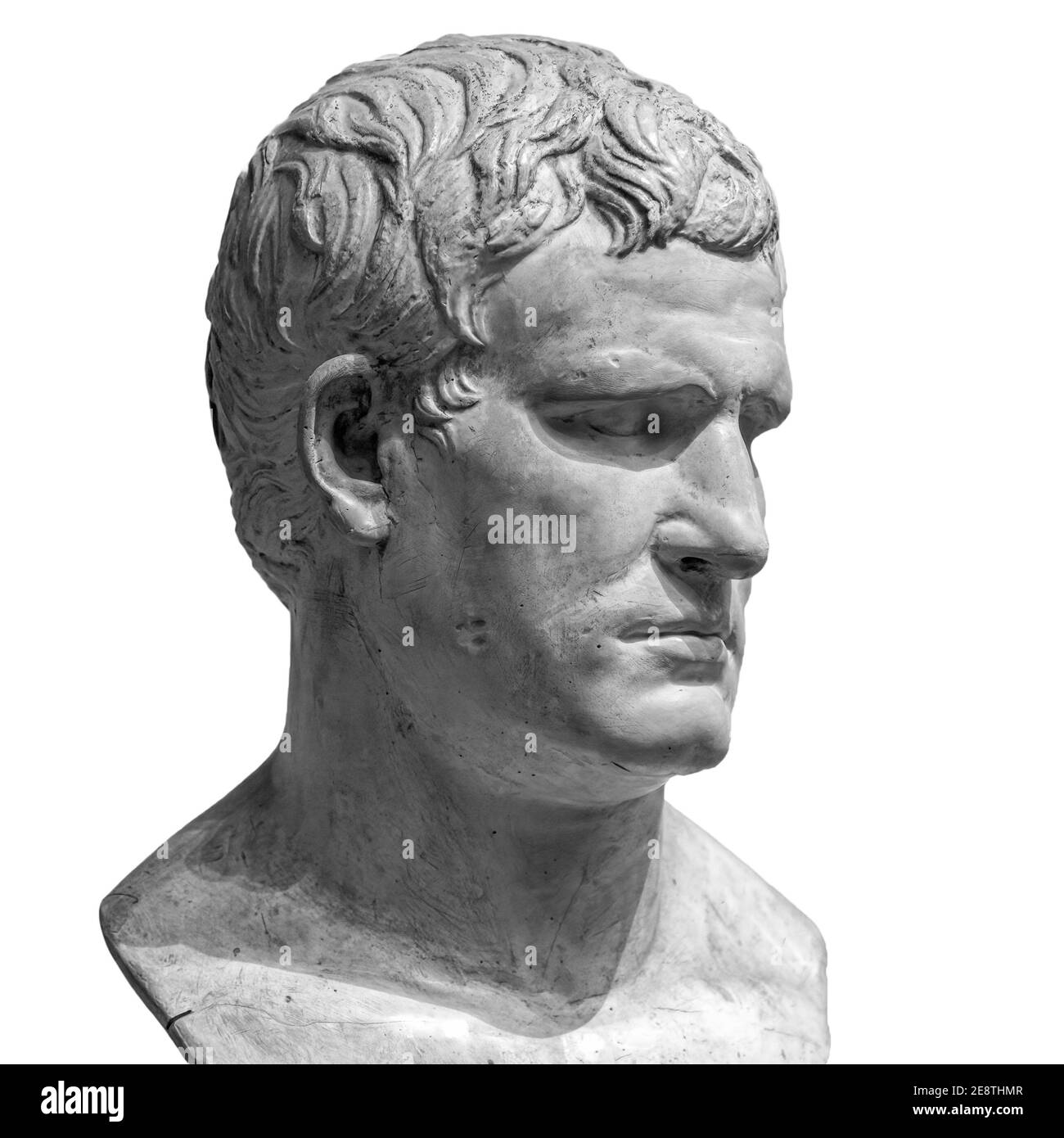 Head detail of the ancient man sculpture. Stone face isolated on white background. Antique