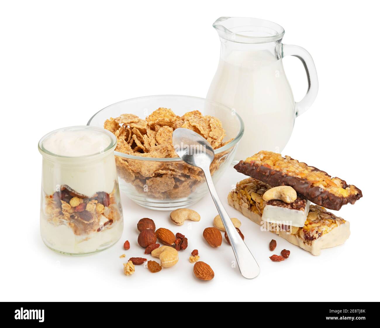 Healthy breakfast with cereal flakes, milk, yogurt with granola, nuts