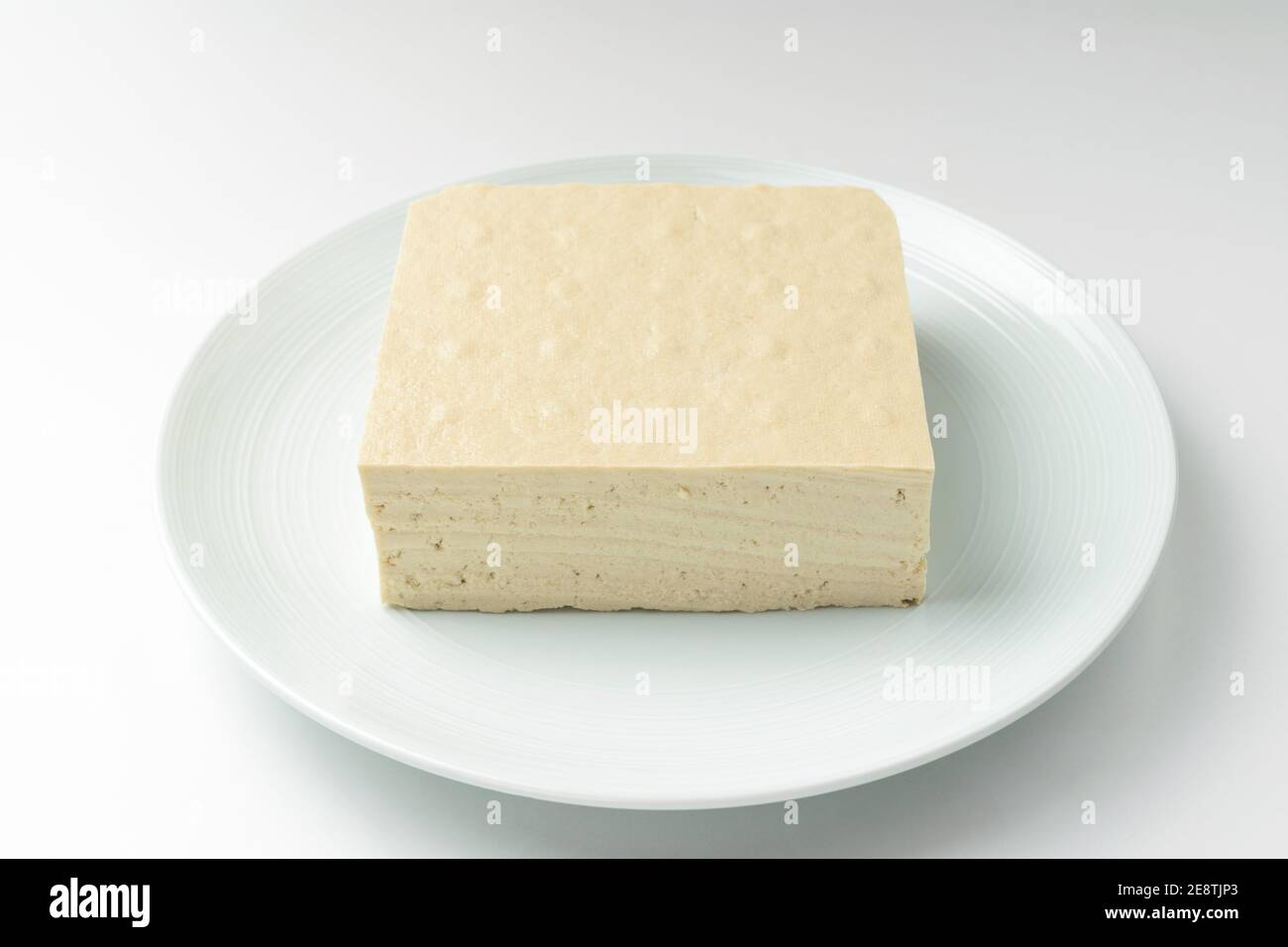 Tofu made with ground beans. Tofu in a square shape. Food made from
