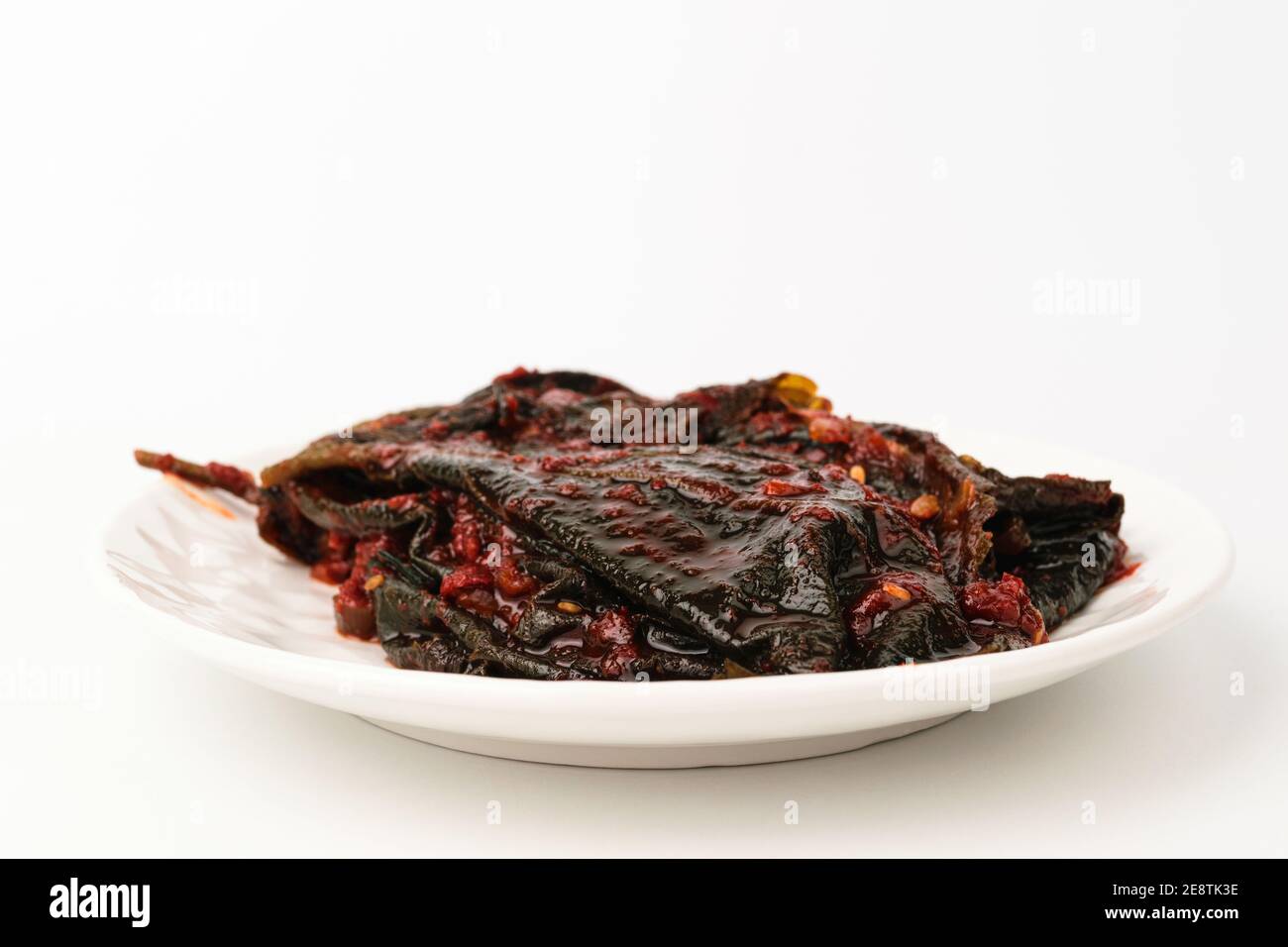 Sesame leaf kimchi on white background Stock Photo Alamy
