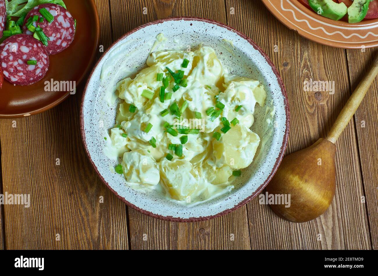Irish Potato Salad, Cut and steam the potatoes until tender Stock Photo