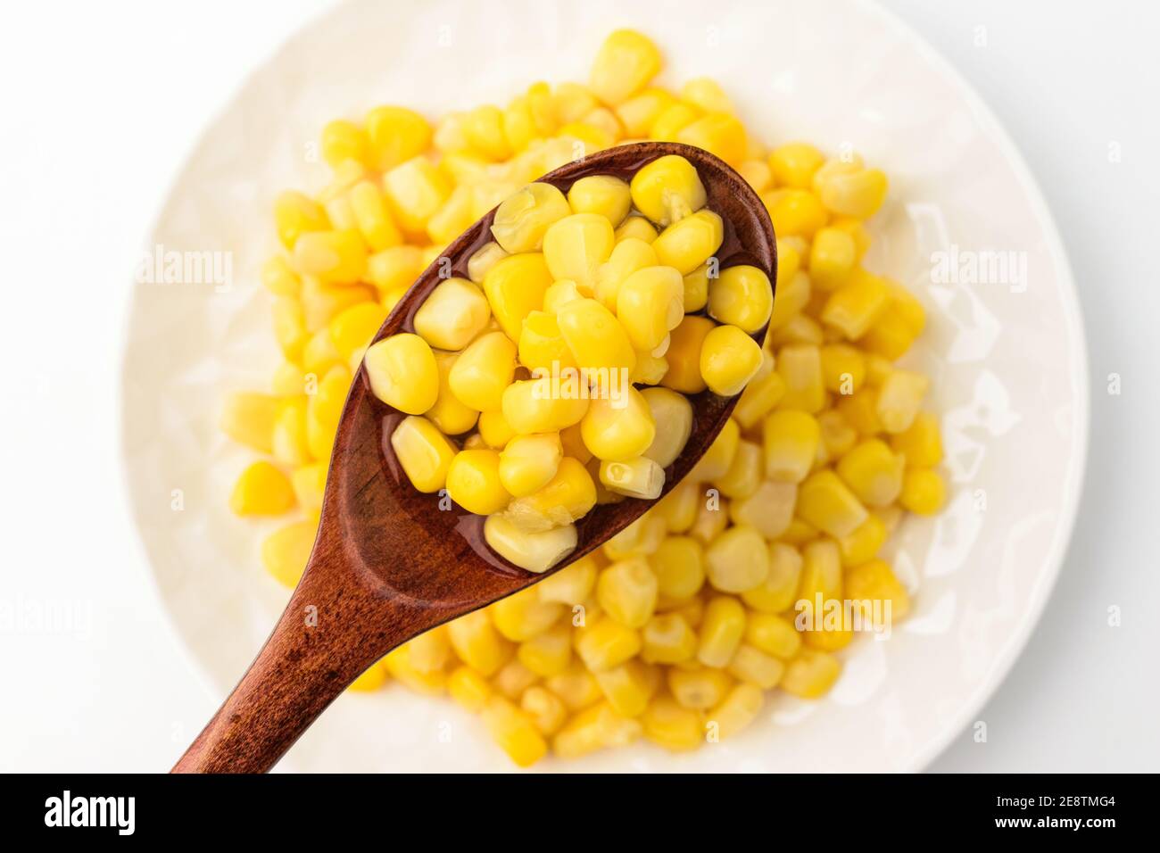 Canned corn on a white background Stock Photo