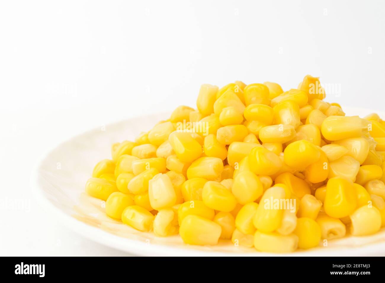 Canned corn on a white background Stock Photo