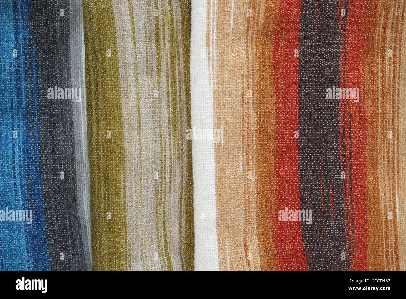 Traditional patterned textiles for sale woven at the Bani Jamra weaving