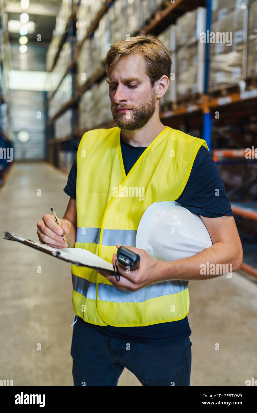 Inventory Computer System Warehouse worker checking inventory hi-res stock photography and images ...