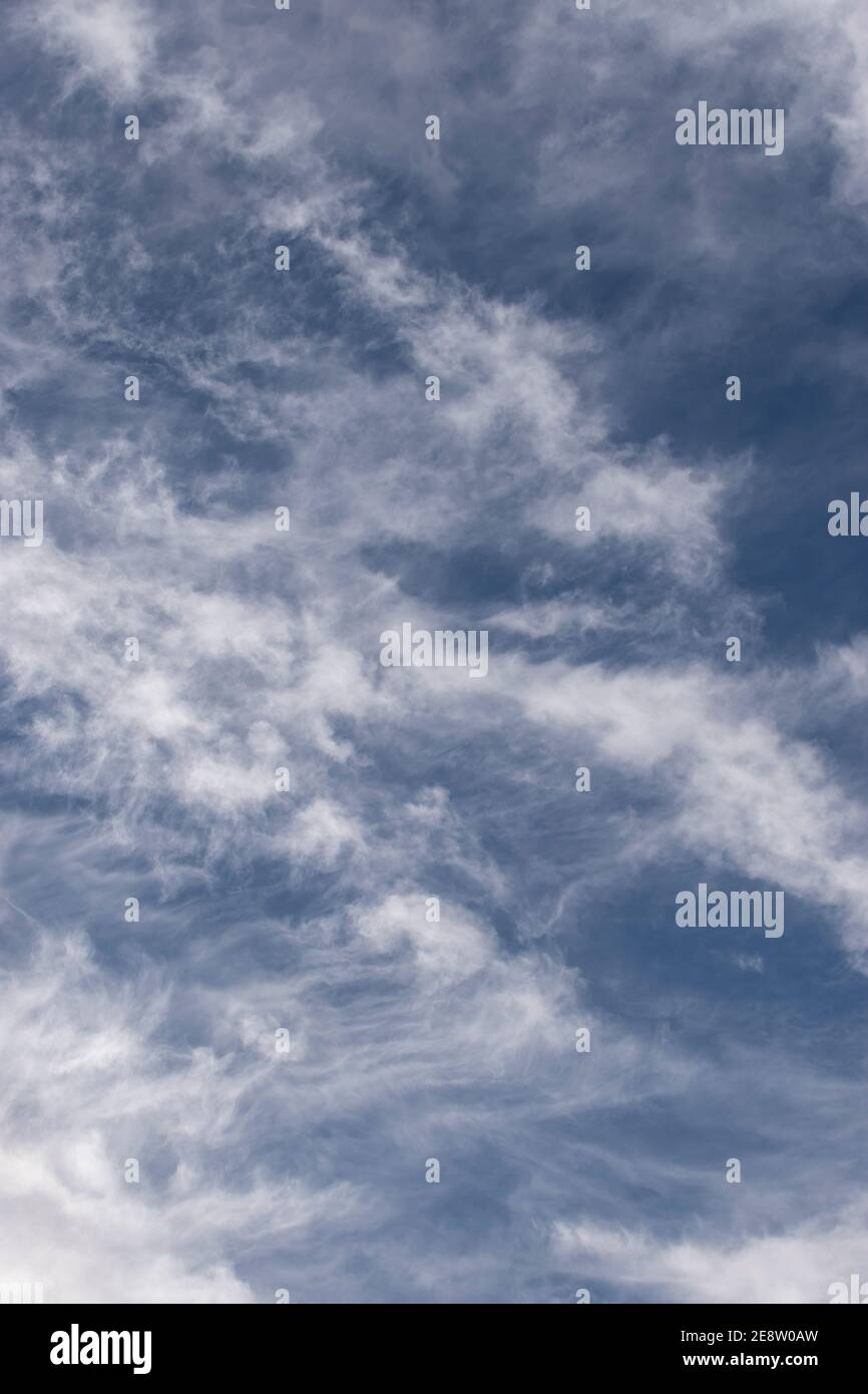 Layers of fluffy white clouds in blue sky. Cloudscape with cirrocumulus ...