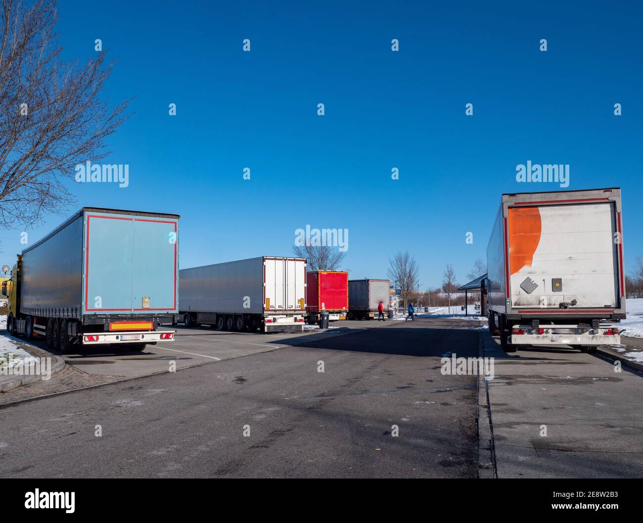 Trucks at a rest area in winter on a German Highway Stock Photo