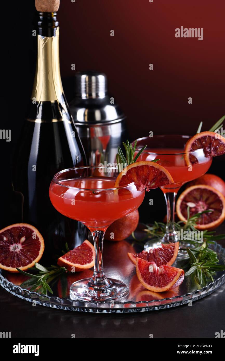 Bloody orange citrus champagne cocktail. Delicious, classy drink that everyone at your   party will love Stock Photo