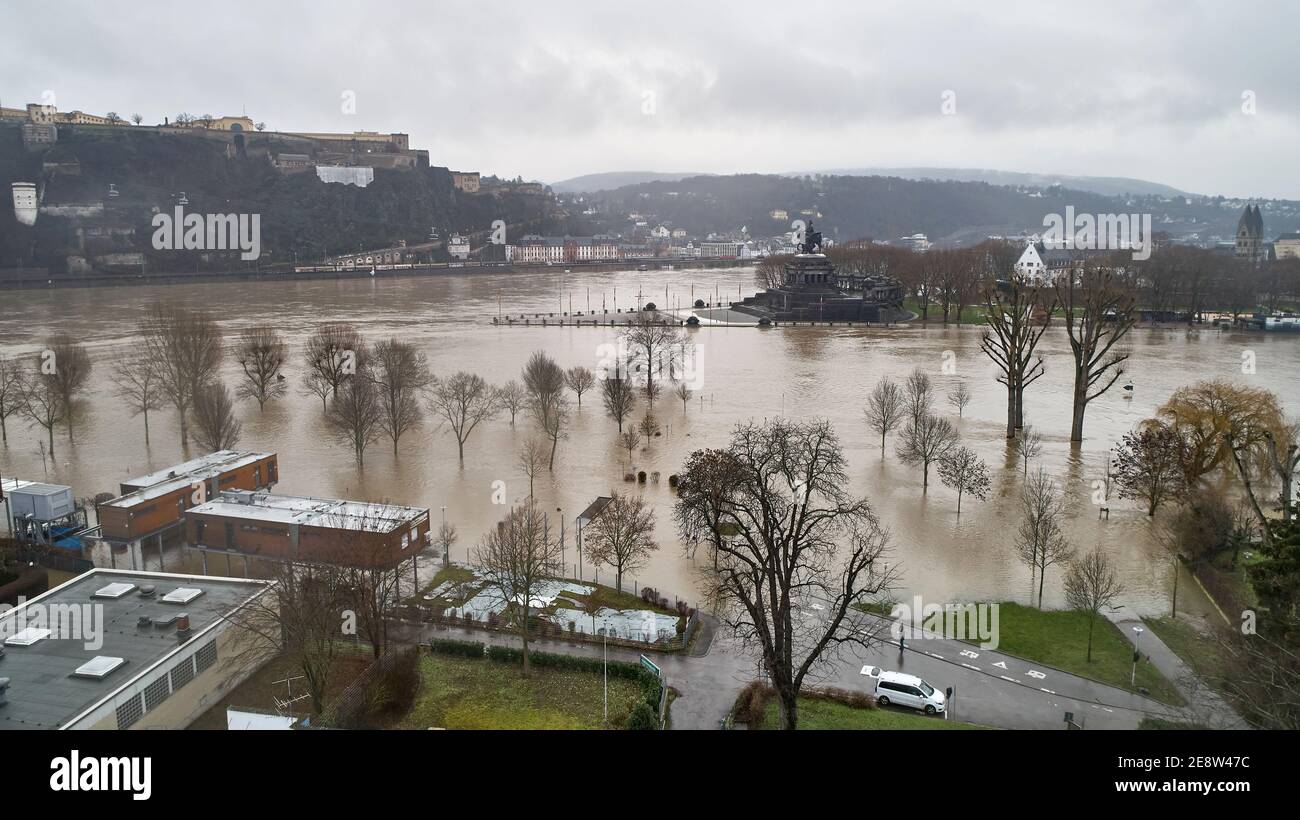 Koblenz, Germany. 01st Feb, 2021. Meadows are flooded at the mouth of the  Moselle into the Rhine at Deutsches Eck (aerial photograph taken with a  drone). Heavy rainfall and the melting snow