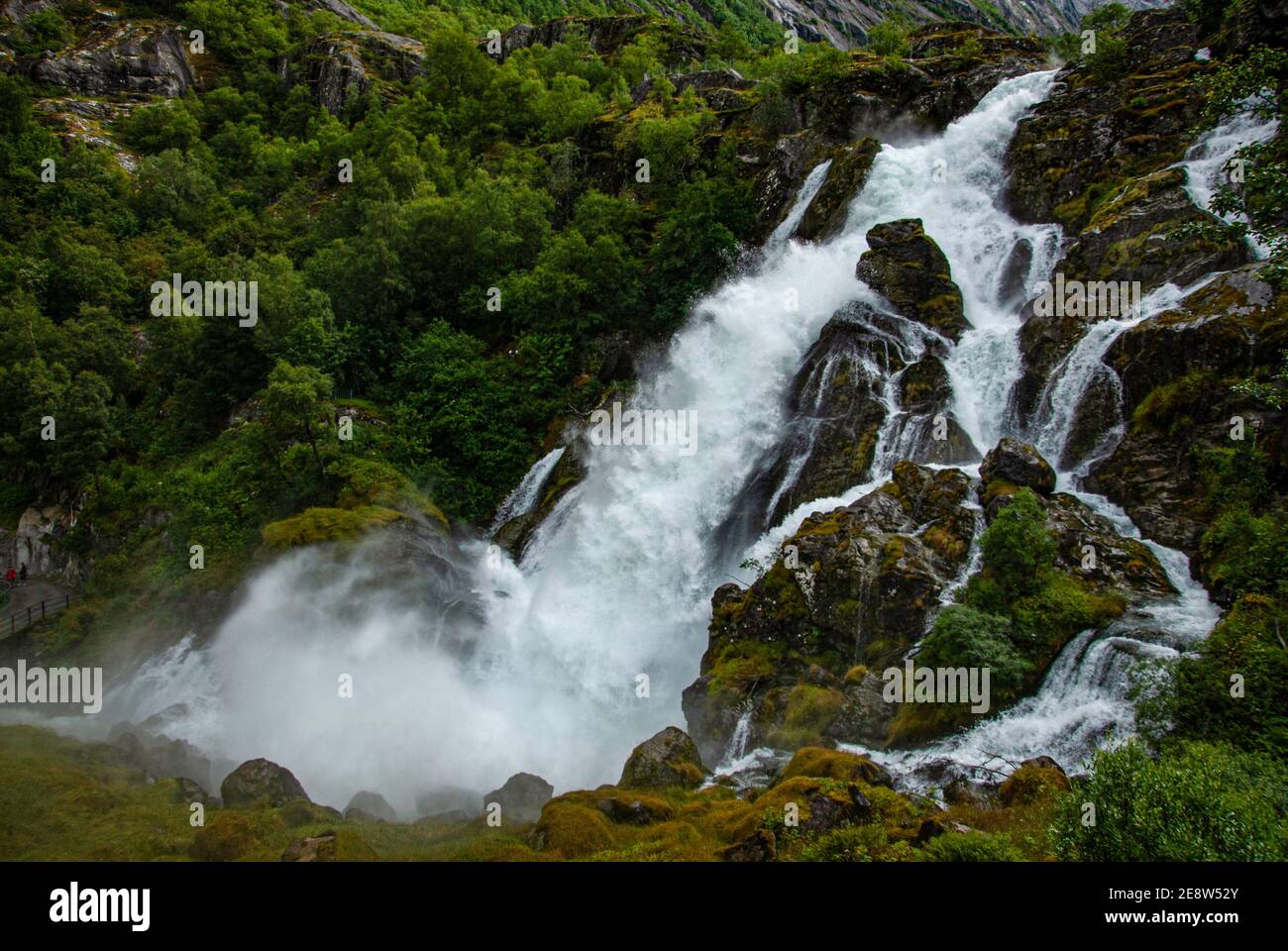 Kleivafossen waterfall, Briksdalselva river, Norway.  The river is fed by the melting Briksdal Glacier (Briksdalsbreen). Stock Photo