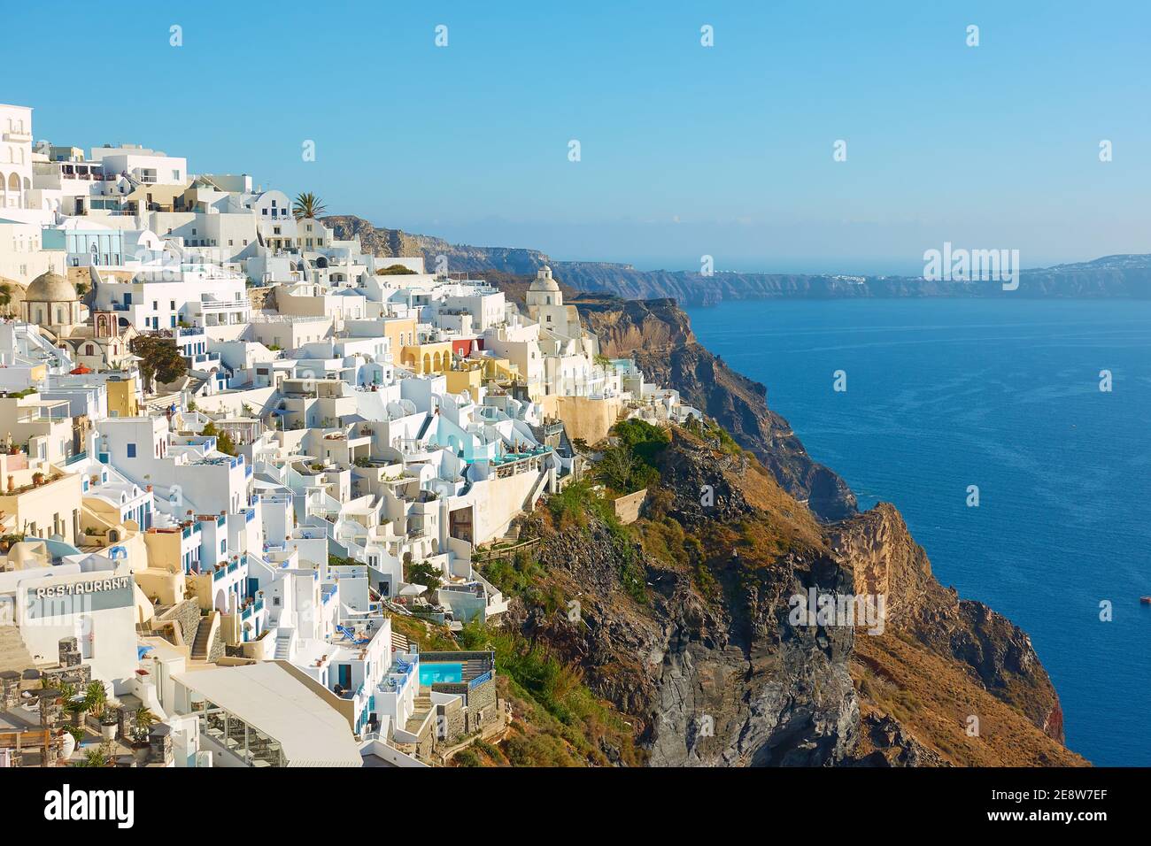Fira town by the sea on mountain coast of Santorini island in Greece. Greek landscape Stock Photo