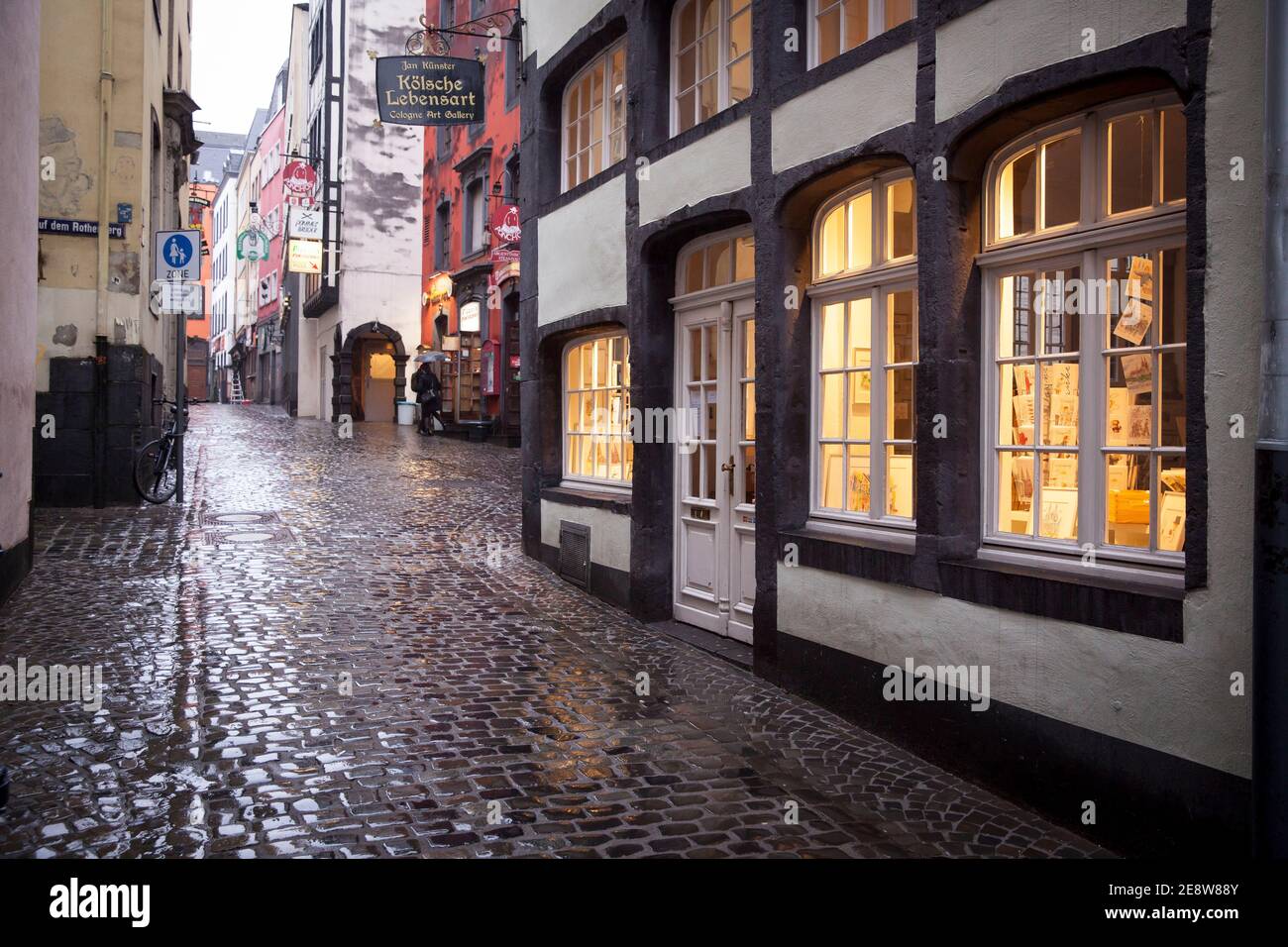 Coronavirus / Covid 19 outbreak, January 28th. 2021. The deserted Salzgasse in the old town, rainy weather,Cologne, Germany.  Coronavirus / Covid 19 K Stock Photo