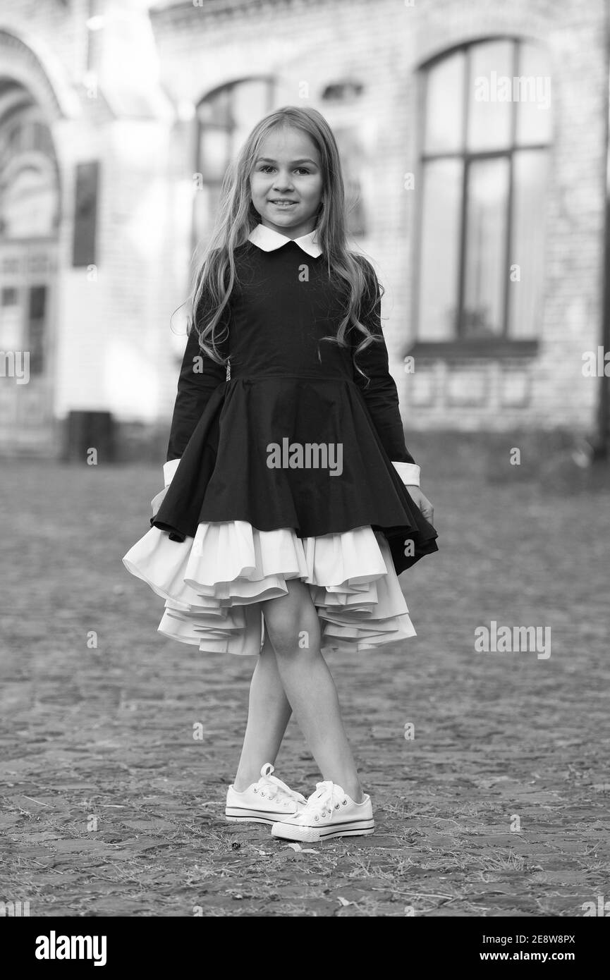 Look sophisticated. Happy child wear uniform in dance position. Back to — free download