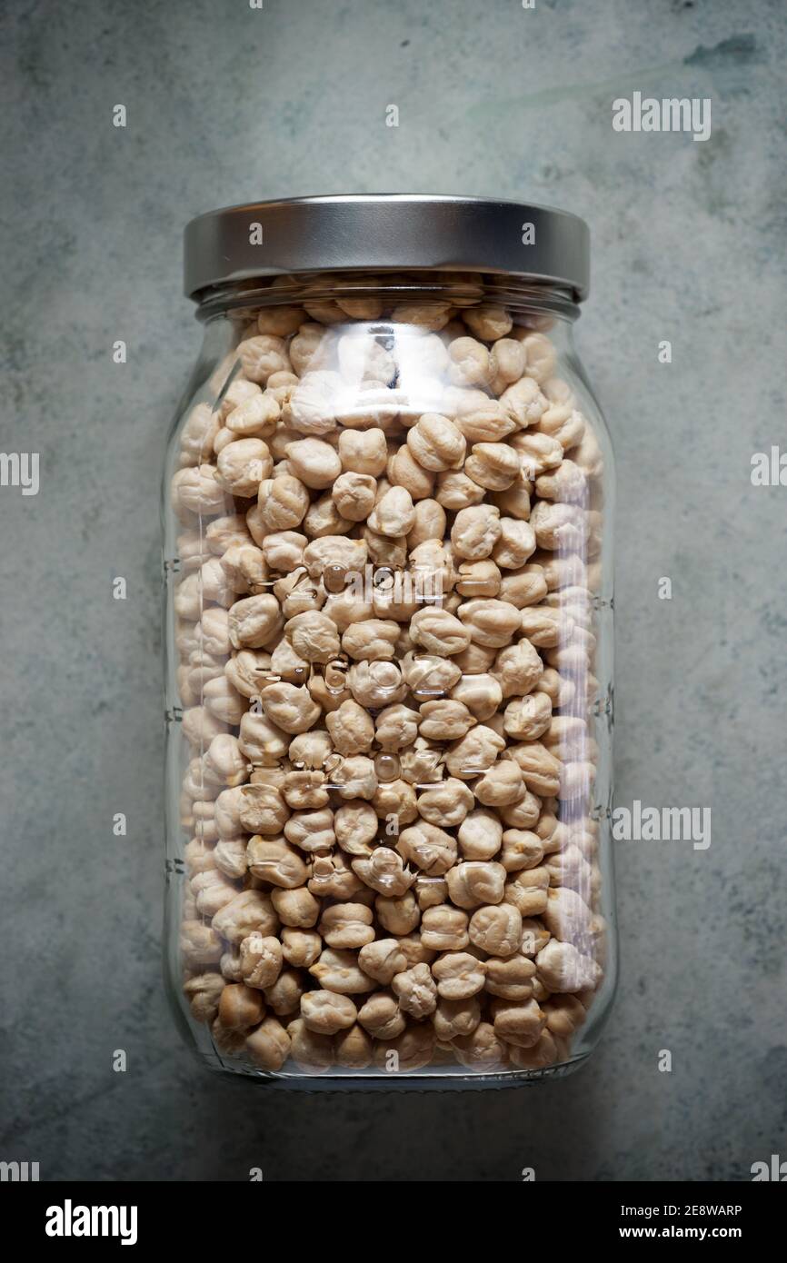 Dried chickpeas in a glass jar Stock Photo Alamy