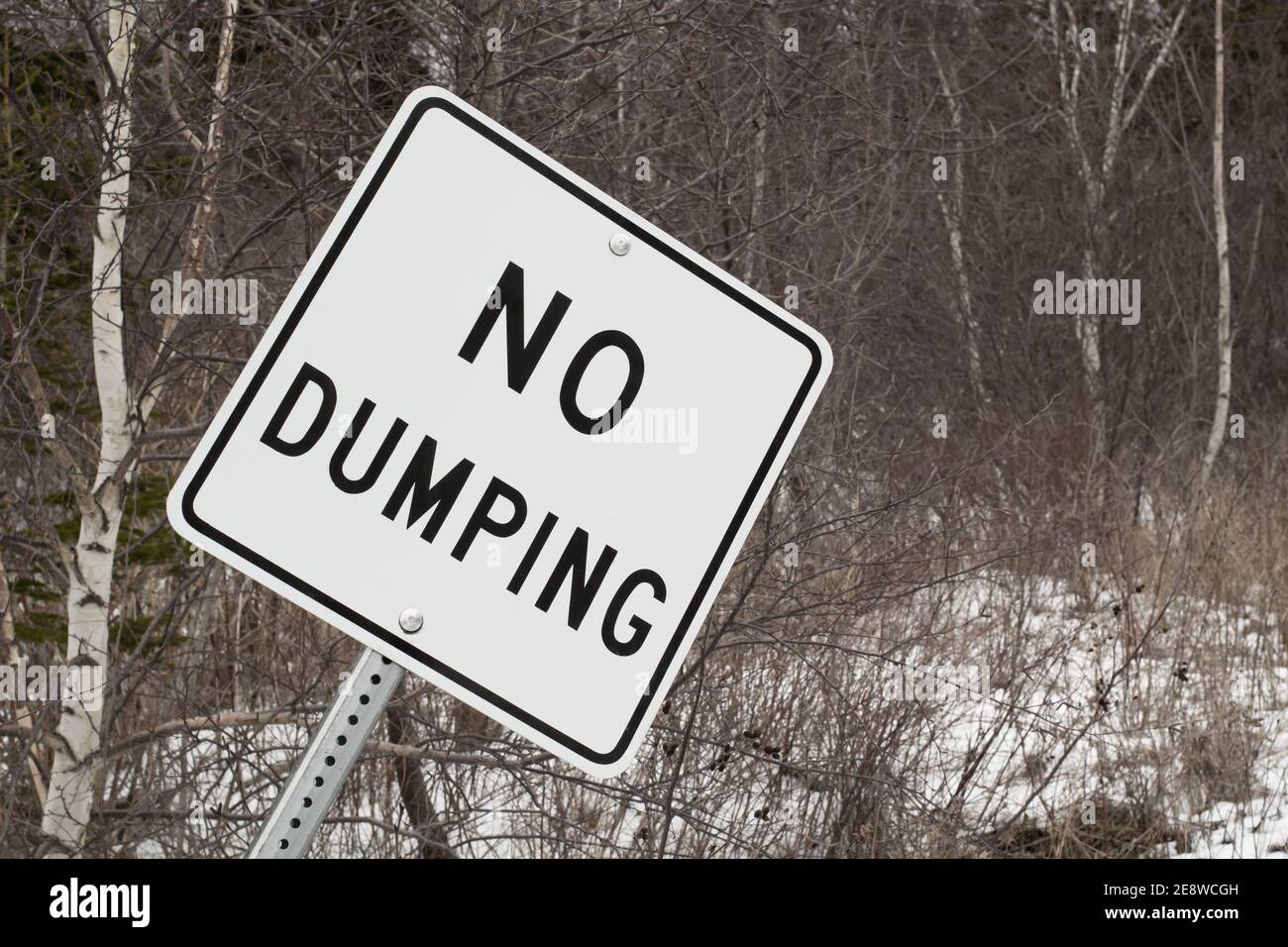 No dumping sign in rural area Stock Photo