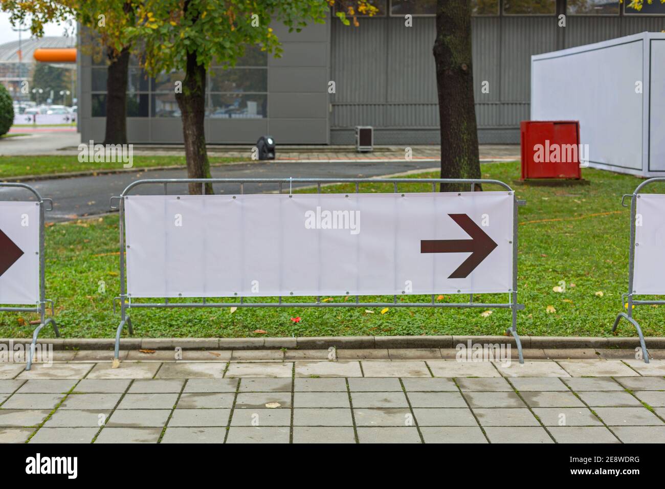 Direction Arrow Empty Space Sign at Outdoor Park Stock Photo - Alamy