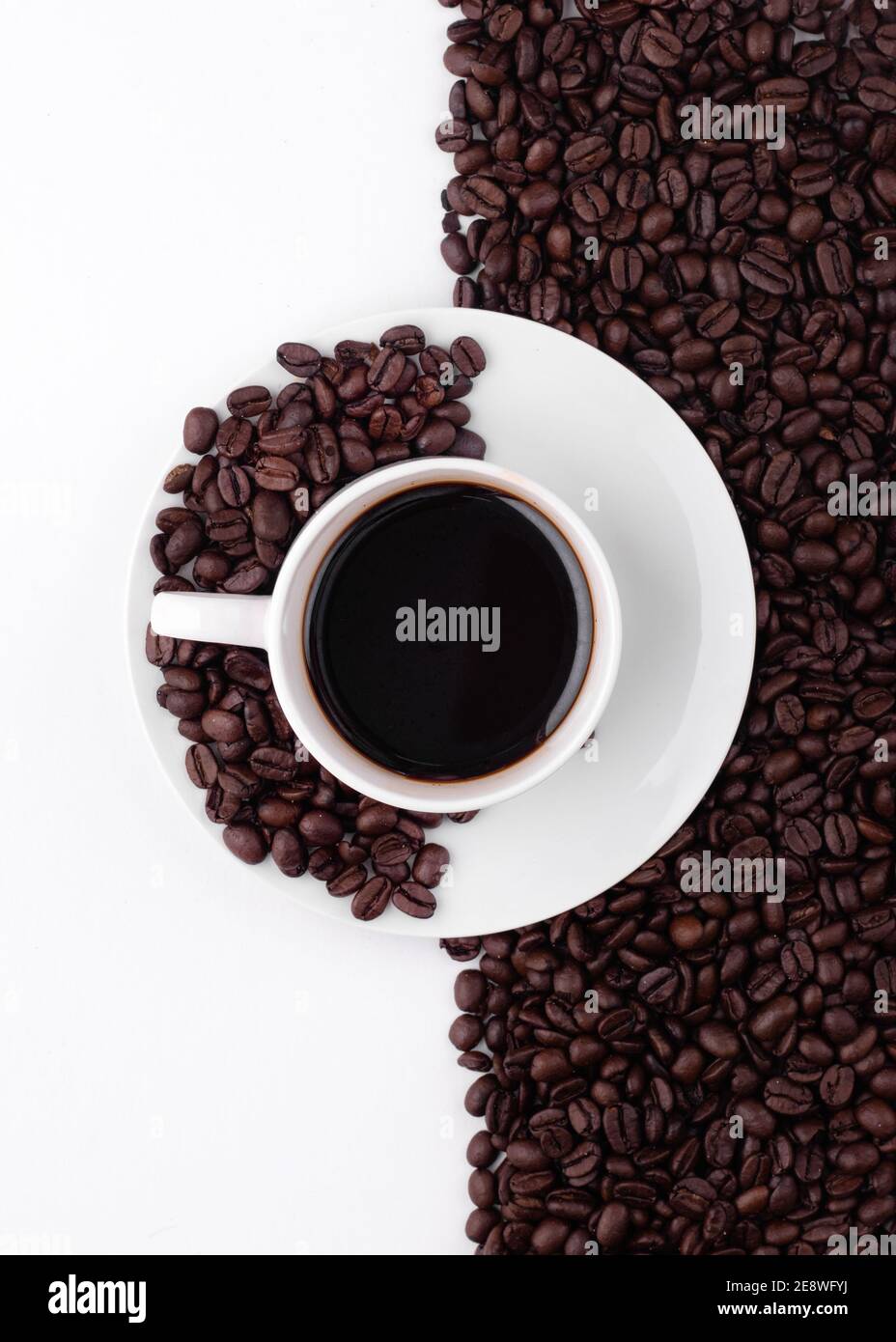 cup of coffee with beans on white background Stock Photo - Alamy