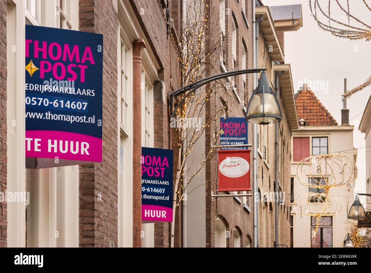 Deventer, The Netherlands - January 14, 2021: Dutch empty stores with for rent signs in the historic city center of Deventer, The Netherlands Stock Photo