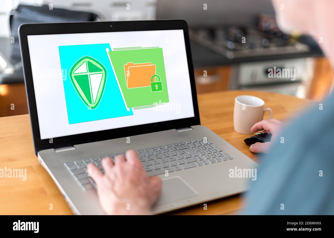Man using a laptop with data protection concept on the screen Stock ...