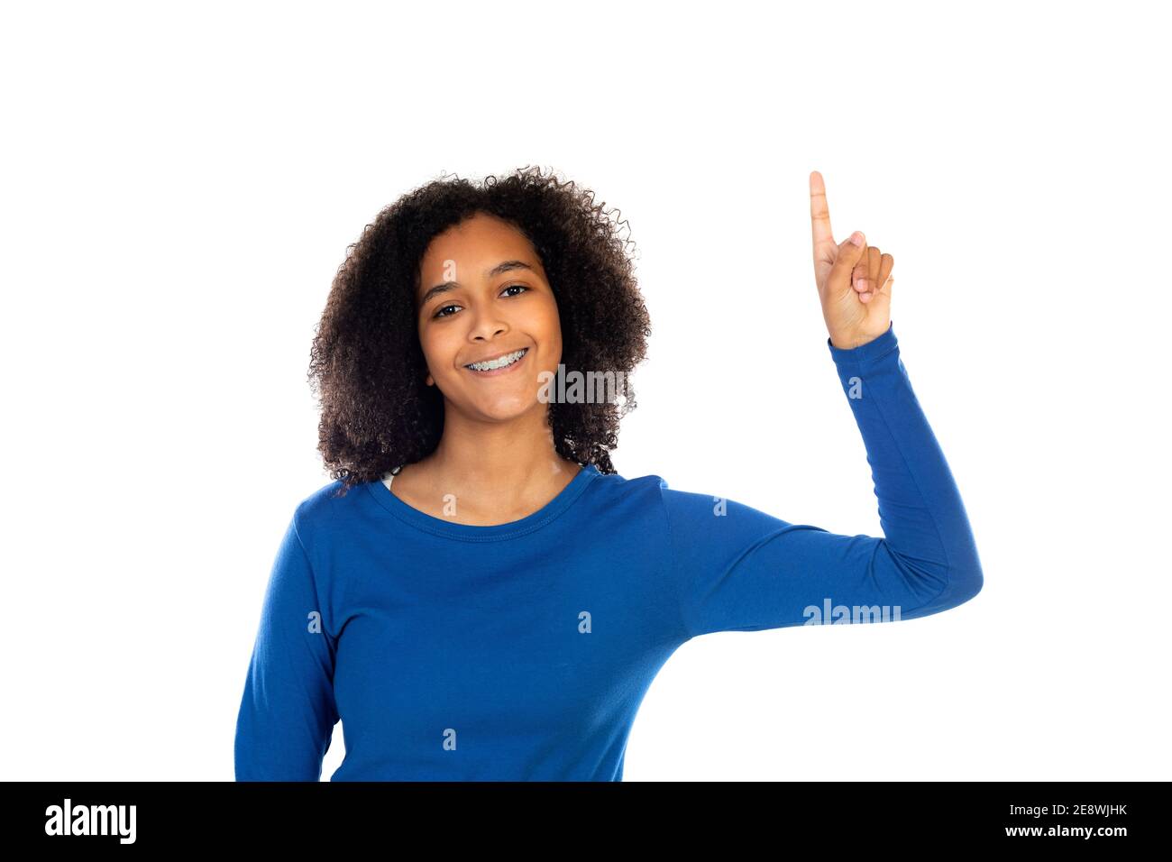 Teenager girl with afro hair wearing blue sweater isolated on a white ...