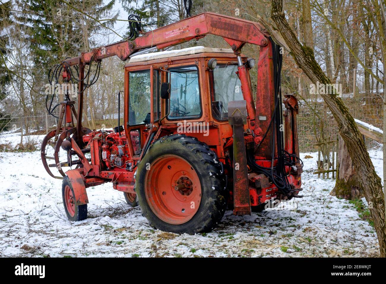 vintage belarus mtz 80 tractor with crane arm manufactured by minsk tractor  works being used to cleared felled trees zala county hungary Stock Photo -  Alamy