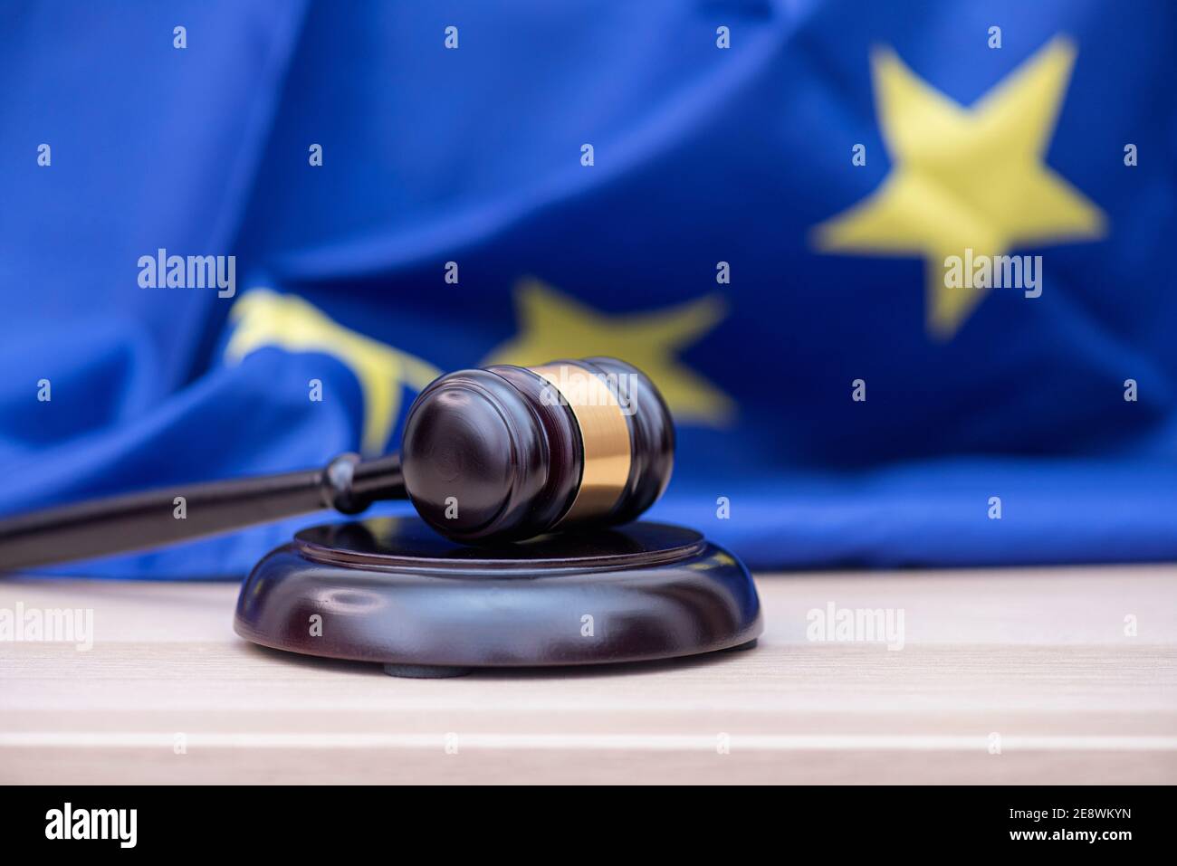 Flag of European Union and judges wooden gavel on the top, concept ...