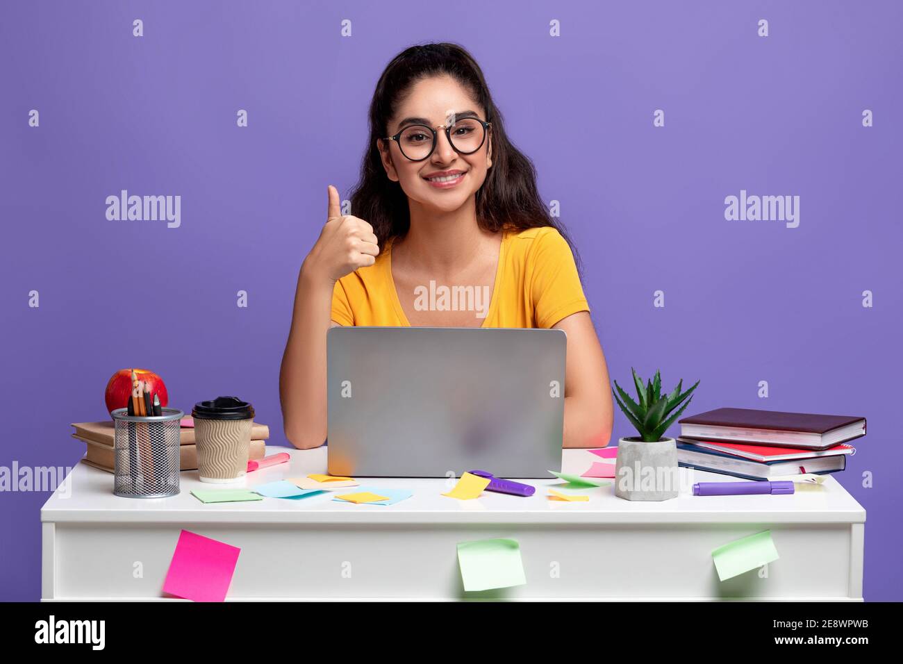 Indian woman showing thumbs up hi-res stock photography and images - Alamy