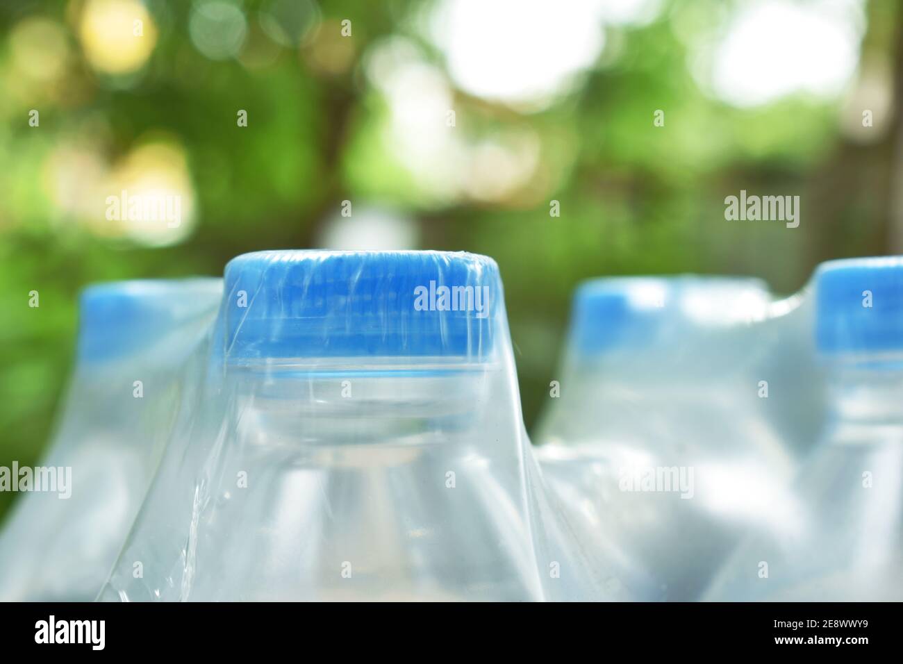 fresh water plastic bottle with blue cap in clear packaging Stock Photo