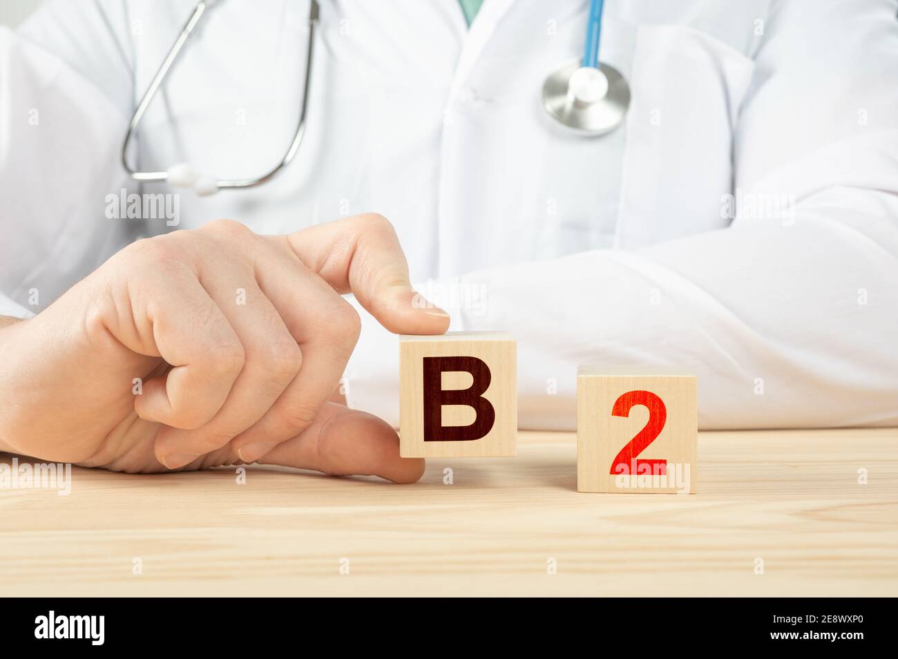 essential vitamins and minerals for humans. doctor taking vitamin b2. doctor talks