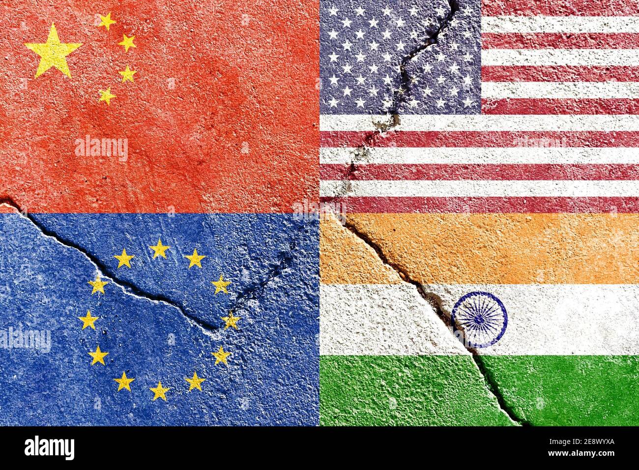Closeup of USA, China, EU, and India flags on weathered and cracked wall background Stock Photo