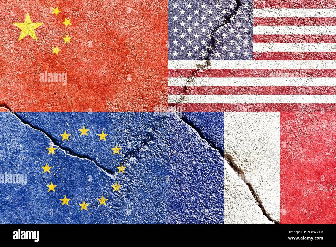Closeup of USA, China, EU, and France flags on weathered and cracked wall background Stock Photo