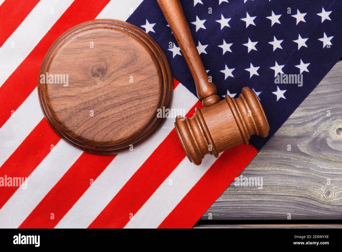 Judges wooden gavel with USA flag. Stock Photo