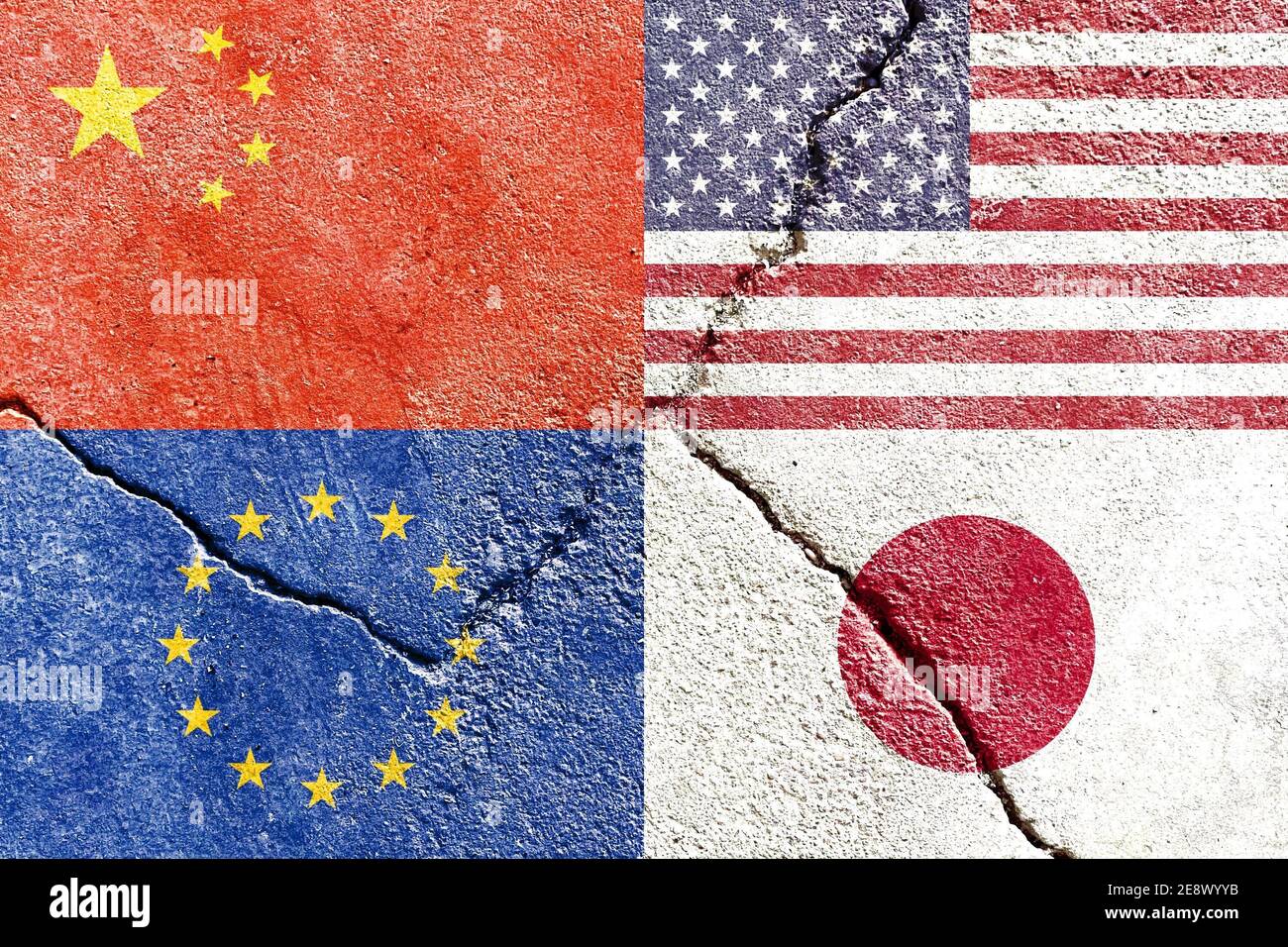 Closeup of USA, Japan, EU, and China flags on weathered and cracked wall background Stock Photo