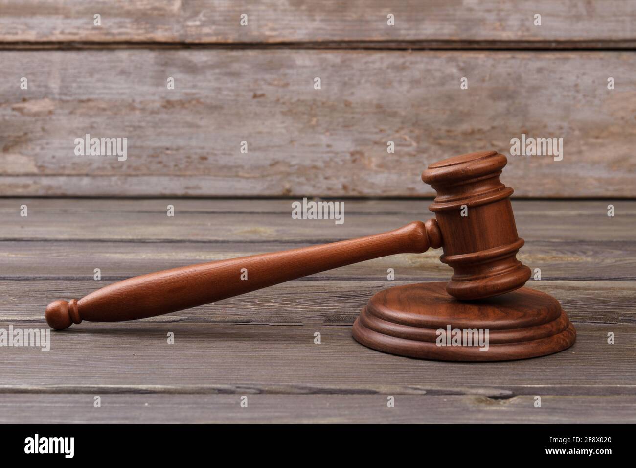 Judges gavel on wooden table. Stock Photo