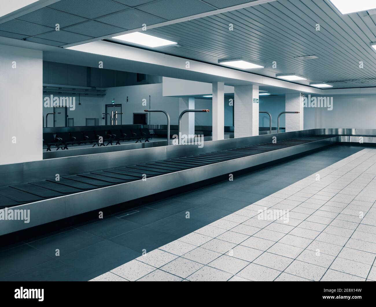 Covid-19 Lockdown - London Luton Airport - Empty Baggage Carousel at Arrivals - Effects of the travel ban due to the Novel Coronavirus Stock Photo