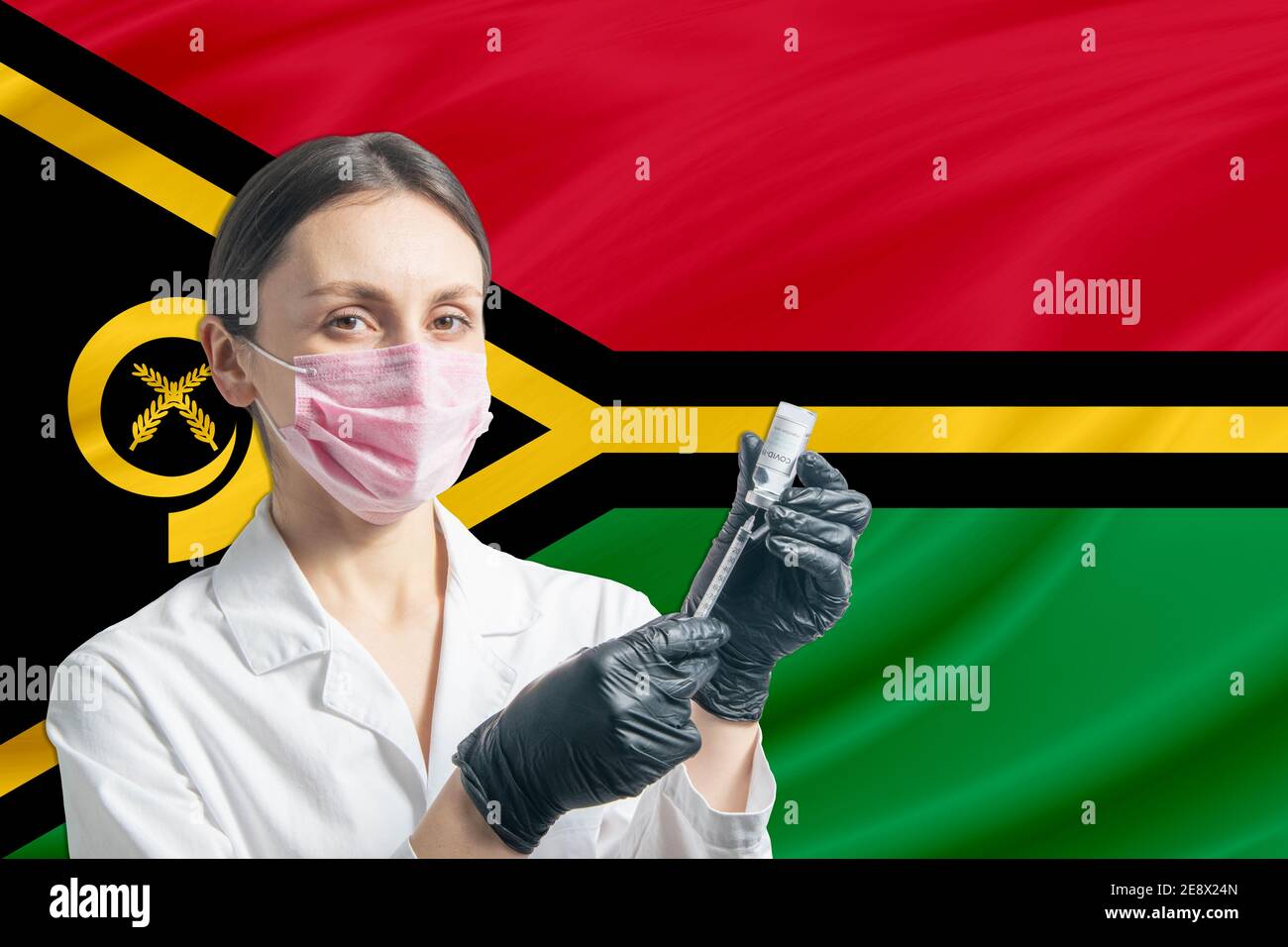 Girl doctor prepares vaccination against the background of the Vanuatu flag. Vaccination concept Vanuatu. Stock Photo